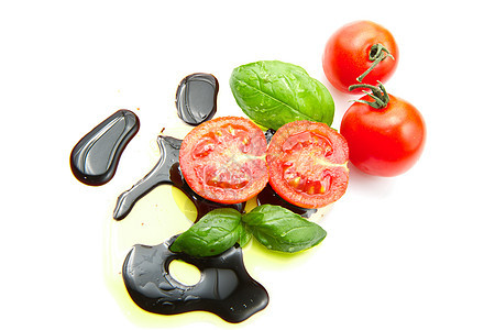 新鲜西红柿 含黄醋草本植物沙拉食物烹饪瓶子红色饮食敷料白色盘子图片