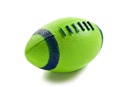绿色玩具橄榄球 在白色上隔离图片