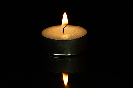 蜡烛婚礼黑色发光辉光火焰背景图片