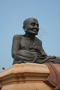 大佛雕塑石头纪念碑精神佛教徒旅行旅游神社黑色雕像背景图片