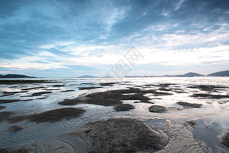 黄昏时沿海岸的香港日落天堂美丽风景河口紫色蓝色海岸线太阳土地天空图片