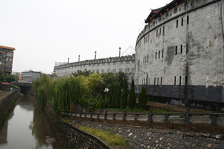 旧城洛阳市的城墙雕塑天空房子旅行城市旗帜金子文化历史小溪图片