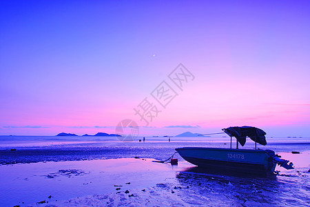 香港海岸的日落天际天蓝色海岸线地平线海滩海浪太阳气候日光反射图片