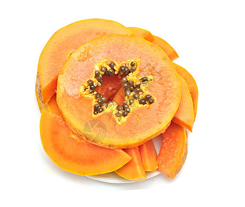 甜胚子木薯果木瓜维生素水果种子白色光盘橙子热带黄色盘子背景