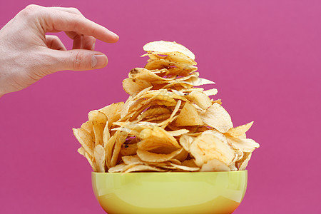 土豆薯片食物筹码盘子问题芯片小吃零食粉色油炸肥胖图片