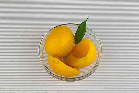 罐头黄桃果味家庭白色罐装黄色食物装罐早餐维生素产品背景图片