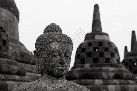 佛教冥想佛教徒岩石金子雕塑沉思力量精神石头雕像图片