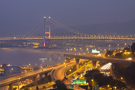 清马桥和日落时的高速公路展示了现代风景图片