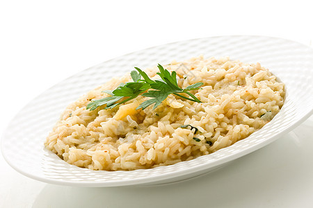 Risotto 配上格拉纳帕米桑奶酪牛奶薄片饮食烹饪粒状粮食谷物美食食物素食图片