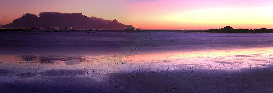 南非海滩的表观南非海滩日落山脉天空海洋日出奇观风景桌景快乐灯光城市图片