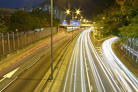 夜间在香港的交通城市车道行人商业街道黑暗旅行蓝色立交桥路面图片
