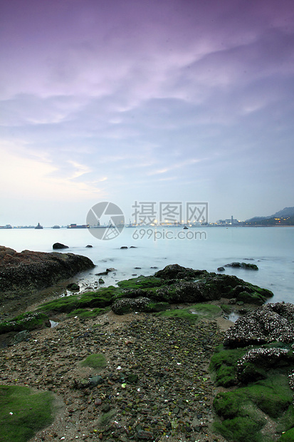 沿海日落全景旅行石头环境阳光巡航热带太阳植物群海景图片