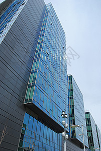 现代办公楼窗户建筑办公室公司商业蓝色反射建筑学技术团体图片