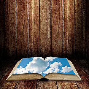 向蓝天打开书本蓝色桌子知识天空空气教训学习图书馆阅读图书图片