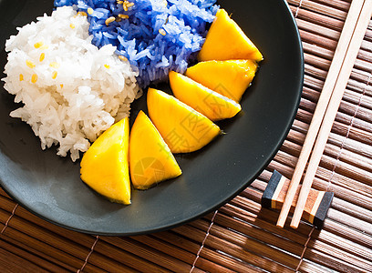泰式甜点 大米和芒果一起吃牙齿盘子竹子食品营养食物热带紫色创意文化图片