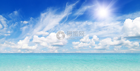 沙滩和热带海放松冲浪阳光海浪海景天空太阳支撑假期晴天图片