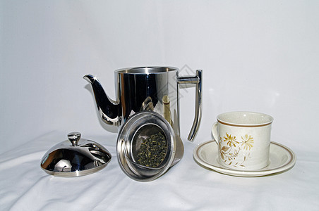 绿色茶茶加茶壶 杯和萨瑟(Sauser)图片