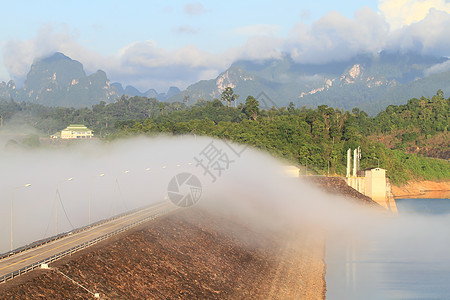 泰国大坝美丽的景观技术棕色爬坡天空岩石水库发电机蓝色绿色力量图片