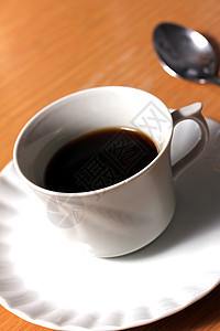 普通咖啡杯液体咖啡店饮料咖啡黑色桌子飞碟盘子商业空白图片