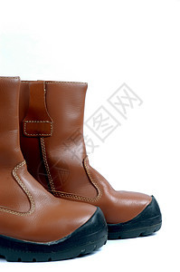一双棕色皮靴职业衣服靴子冒险远足鞋类安全活动皮革花边图片