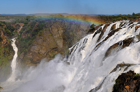 直击低价纳米比亚鲁阿卡纳瀑布戏剧性急流苦烯科兰巨石洪水岩石峡谷枯烯彩虹背景