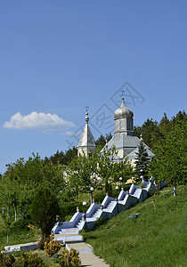 科萨提修道院大教堂天空爬坡城堡石头城市蓝色场景文化圆顶图片