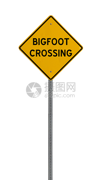 孤立的黄色驾驶警告标志大脚路口图片
