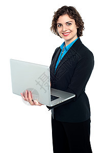 从事膝上型电脑工作的女经理图片