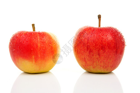 两个多汁的红苹果背景图片
