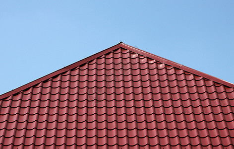 红砖屋顶维修天空房子大厦蓝色红色建筑建筑学背景图片
