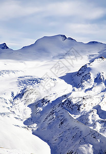 冬季雪雪景观地标岩石冰川高度蓝色阳光晴天顶峰地形首脑图片