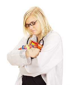 医生抱着一些礼物洗礼成功临床喜悦医师婴儿药品孩子们派对销售图片