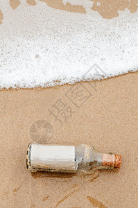 在瓶中发来的信息空格概念静物海滩波浪瓶子图片