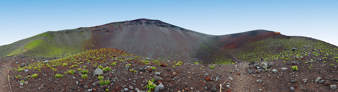 富士山面积顶峰灌木远足瓦砾冒险天空火山公吨植物山腰高清图片