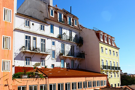 葡萄牙里斯本一栋旧大楼的详情石灰石城市木头入口锁孔锁定历史门把手金属商业图片