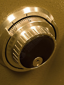 安全输电组合 Spinner 的特写物品现金色调秘密钥匙商业金属拨号旅行银行业图片