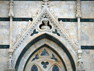 锡耶纳杜奥莫拱廊雕塑教会窗户大教堂圣母圆顶大理石拱形建筑学背景图片