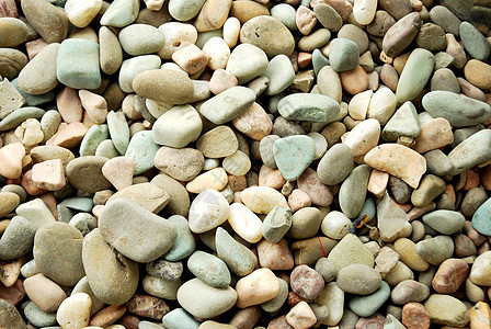 砾石背景伸长灰色圆形花岗岩卵石矿物白色岩石墙纸海滩碎石图片