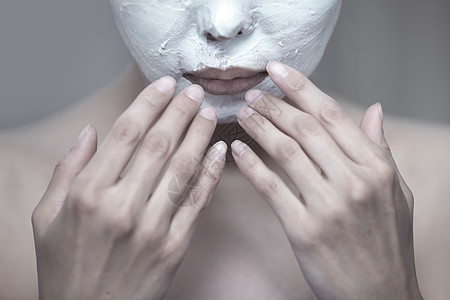 面罩护理女性擦洗按摩呵护口罩抗皱享受美丽福利背景图片