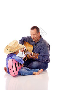 父亲和儿子活动学习男人地面孩子爸爸乐趣男性教学音乐图片