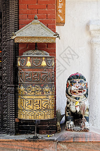 加德满都的祈祷车轮文化祝福宗教冥想佛塔金属青铜寺庙信仰传统图片