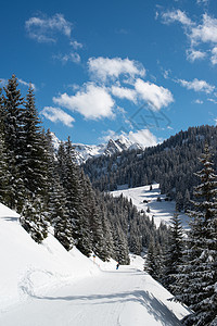 Montafon滑雪山谷运动爬坡地质学活动假期岩石阳光游客天空巅峰图片