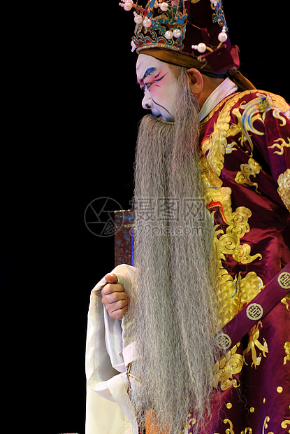中国传统歌剧演员 演戏服和戏剧服装舞蹈文化男人艺术庆典节日化妆品娱乐彩绘男性图片