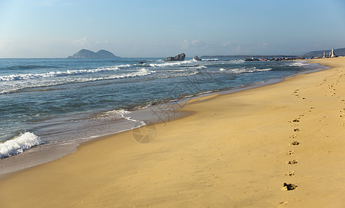 蓝色天空和海沙滩的背景图像海岸冲浪热带太阳季节海洋海滩地平线旅行风景图片