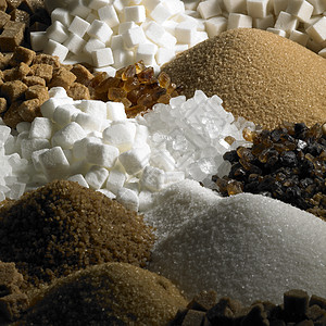 含糖尚可食糖食物糖果静物棕色内饰白色食品肿块块糖营养图片