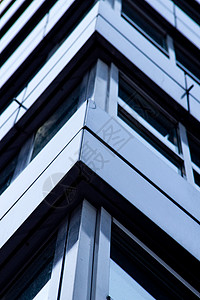 商业办公楼办公室外观建筑结构金融摩天大楼蓝色背景图片