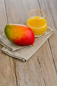 新鲜芒果汁橙子甜点水壶果味液体水果奶油状热带情调黄色图片