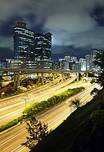 通过香港市中心的交通流量景观小径公共汽车天空建筑运动地标戏剧性运输办公室图片