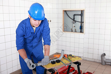 安装管道工办公室工具瓷砖框架锯子改革蓝色地面红色弯头图片