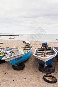小型渔船渔夫钓鱼海滩太阳海洋假期海岸旅游发动机旅行图片